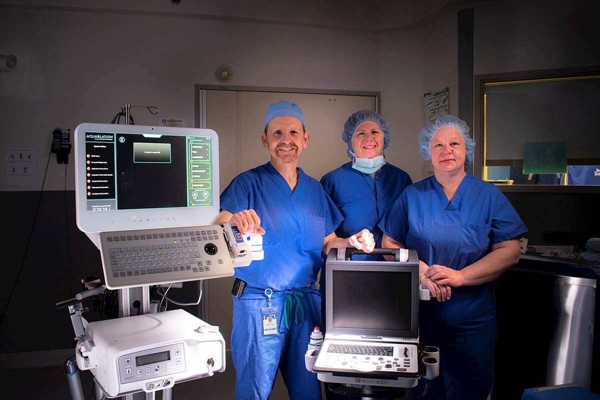 Arnold Sarazen, MD and surgical team with AquaBeam system in an Operating Room at South County Hospital