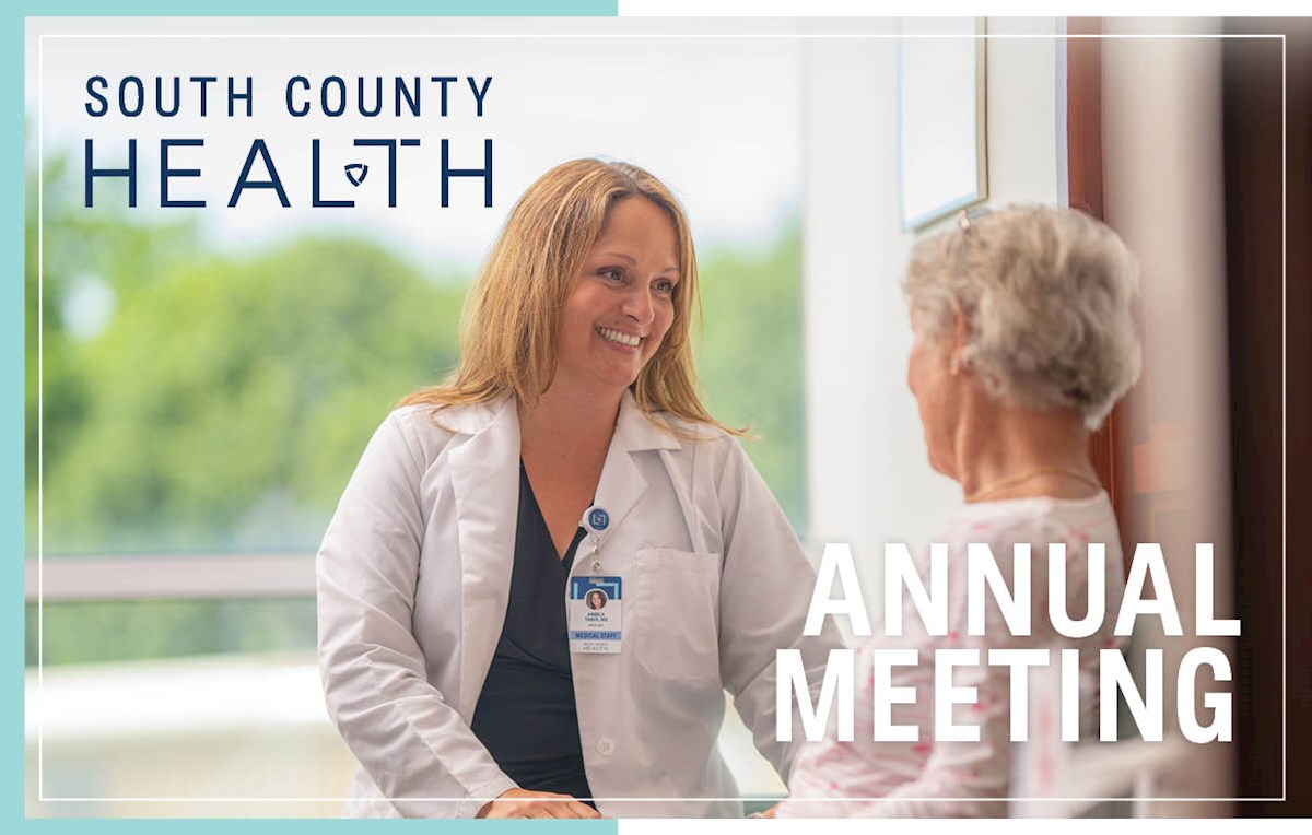 Angela Taber, MD speaks with patient in South County Hospital Cancer Center