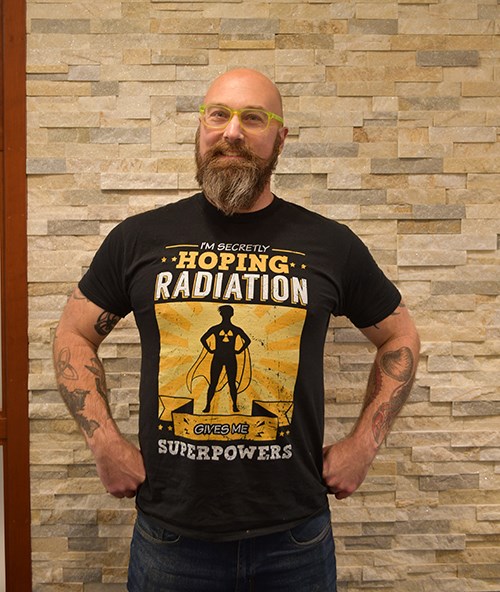 Bryan Clayton's shirt reads "I'm secretly hoping radiation gives me superpowers"